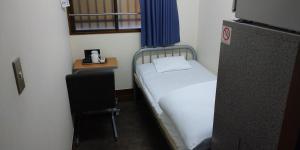 Cama o camas de una habitación en Economy Hotel Hoteiya