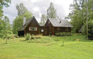 A garden outside Stunning Home In Lidhult With 3 Bedrooms And Wifi