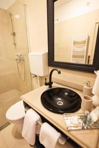 Kúpeľňa v ubytovaní Luxury city center Apartment ANGELS RM