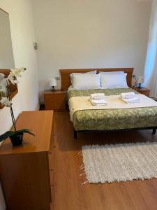 Кровать или кровати в номере Patos Beach III - Olas
