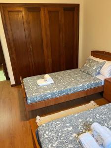 Кровать или кровати в номере Patos Beach III - Olas
