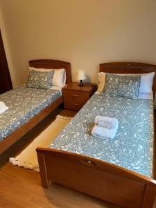 Кровать или кровати в номере Patos Beach III - Olas