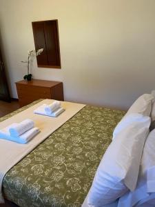Кровать или кровати в номере Patos Beach III - Olas