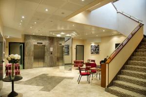 The lobby or reception area at Abacus Hotel