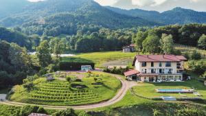 an aerial view of a house in the mountains at Cascina il Faggio in Mosso Santa Maria