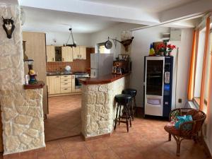 Kuchyň nebo kuchyňský kout v ubytování Vila Ianis Bran