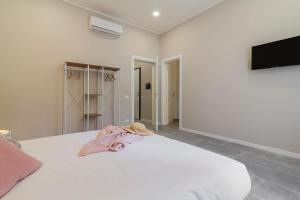 A bed or beds in a room at Luce Marmore