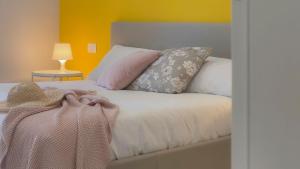 A bed or beds in a room at Luce Marmore