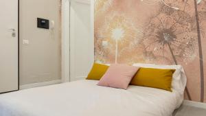 A bed or beds in a room at Luce Marmore