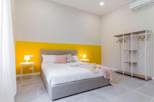 A bed or beds in a room at Luce Marmore