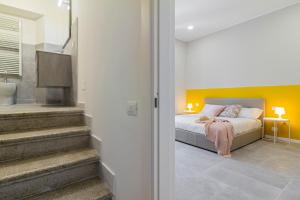 A bed or beds in a room at Luce Marmore