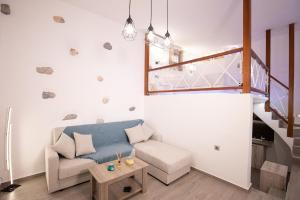 Posezení v ubytování Primrose Apartments + 31 fotografií