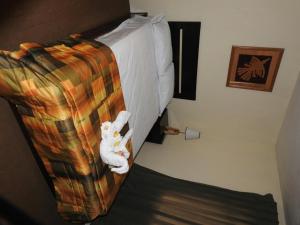 Ένα ή περισσότερα κρεβάτια σε δωμάτιο στο Hostal Samichay