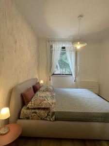Posteľ alebo postele v izbe v ubytovaní Silos Torrenova suite