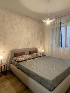 Posteľ alebo postele v izbe v ubytovaní Silos Torrenova suite