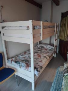 a pair of bunk beds in a room at Počitniška hiša Morski pogled in Mošćenička Draga +34 photos