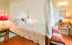 Ένα ή περισσότερα κρεβάτια σε δωμάτιο στο Beausejour Guest House