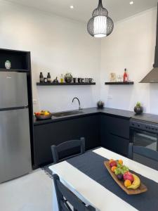 Kuchyň nebo kuchyňský kout v ubytování Artelie apartment