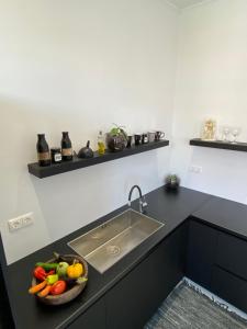 Kuchyň nebo kuchyňský kout v ubytování Artelie apartment