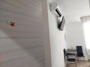 TV a/nebo společenská místnost v ubytování Vapama Rooms