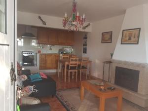 TV a/nebo společenská místnost v ubytování Casa de Campo Melides