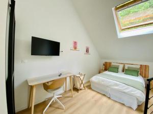 Posteľ alebo postele v izbe v ubytovaní Duplex avec parking proche Stade de la Beaujoire, parc des expositions, bord de l'Erdre