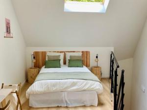 Posteľ alebo postele v izbe v ubytovaní Duplex avec parking proche Stade de la Beaujoire, parc des expositions, bord de l'Erdre