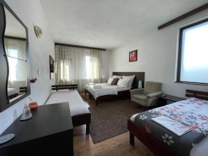Postel nebo postele na pokoji v ubytování Guest house Elit