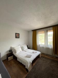 Postel nebo postele na pokoji v ubytování Guest house Elit
