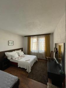 Postel nebo postele na pokoji v ubytování Guest house Elit
