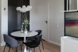 Televízia a/alebo spoločenská miestnosť v ubytovaní Apartament Chlebova 315