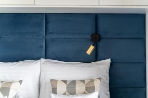 Posteľ alebo postele v izbe v ubytovaní Apartament Nadmotławie 115