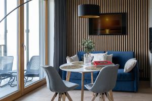 Posedenie v ubytovaní Apartament Nadmotławie 115