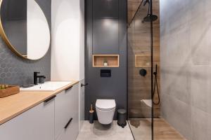 Kúpeľňa v ubytovaní Apartament Nadmotławie 115