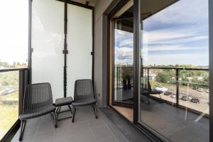 Balkón alebo terasa v ubytovaní Apartament Nadmotławie 115