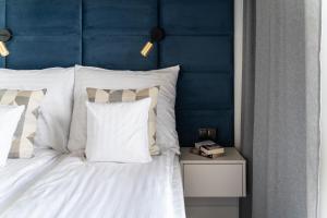 Posteľ alebo postele v izbe v ubytovaní Apartament Nadmotławie 115