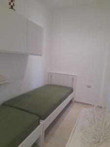 Postel nebo postele na pokoji v ubytování VILLA BELSITO