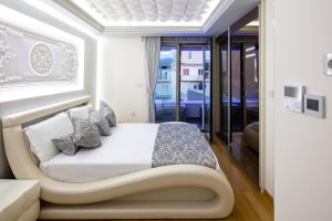Posezení v ubytování De President Suite, DeMaNi President Suites