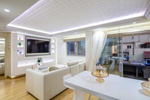 Posezení v ubytování De President Suite, DeMaNi President Suites