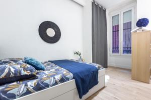 Posteľ alebo postele v izbe v ubytovaní Grand Appartement au coeur du centre Historique