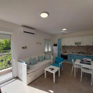 Χώρος καθιστικού στο Apartman Aquarelle