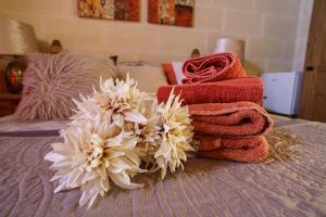 Кровать или кровати в номере Ajuga Luxury Boutique B&B