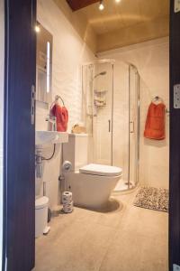 Ванная комната в Ajuga Luxury Boutique B&B
