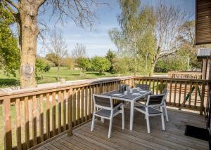 Balcony o terrace sa Hawthorn Glen Lodges