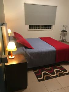A bed or beds in a room at Casa con pileta entre bodegas y viñedos - Habitación con baño en suite