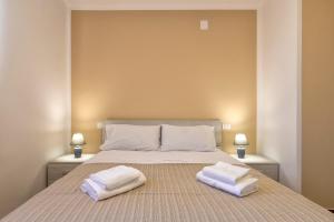 Posteľ alebo postele v izbe v ubytovaní Vico Rooms