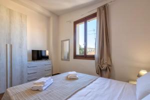 Posteľ alebo postele v izbe v ubytovaní Vico Rooms