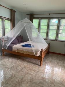 Una cama o camas en una habitación de Lucky Resort