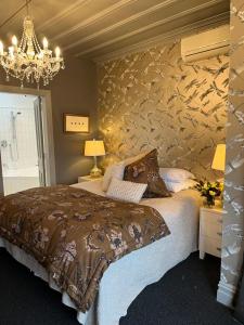Uma cama ou camas num quarto em Nice Hotel
