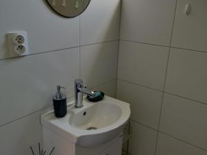 Um banheiro em holiday home, Kolczewo